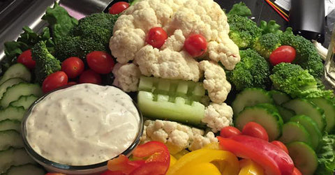 veggies and dip arranged to look like a skull