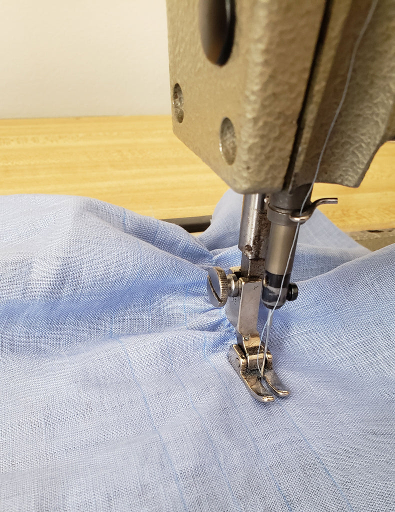 fabric being sewn