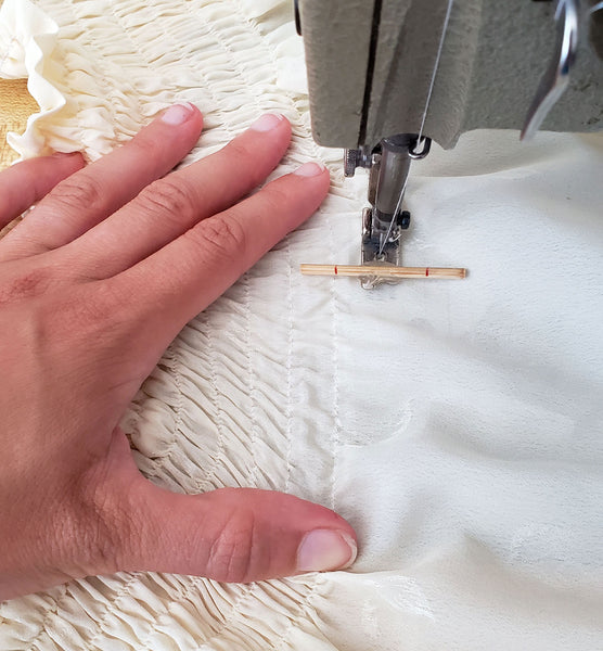 showing the boder guide foot in use while sewing shirring