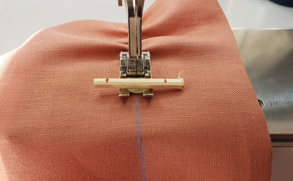 The fist row of shirring is sewn following the chalk guideling
