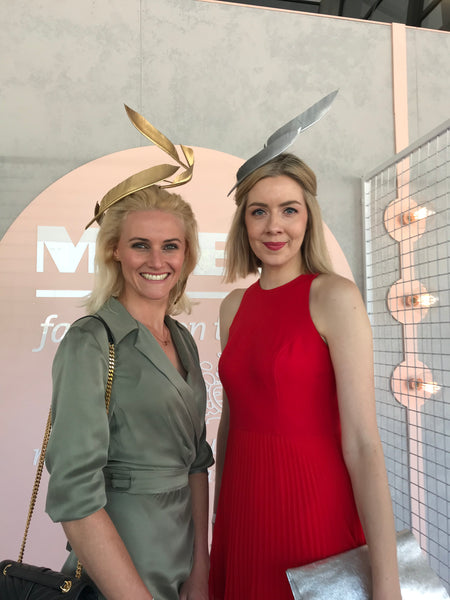 Georgina Egan (model) and Louise from Georgette Millinery (right). At Oaks Day, Melbourne. #Gold #Headpiece #Feather #crown