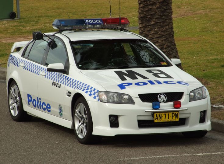 car with purple flashing lights