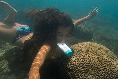 Girl Swimming by Reef