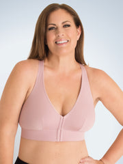Brunette woman wearing a light pink bra