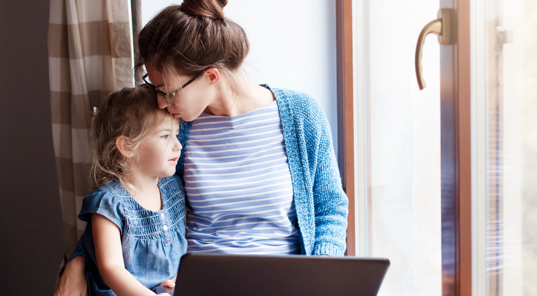 Woman with sittiing with toddler