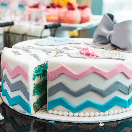 Gender reveal themed cake with blue cake filling.