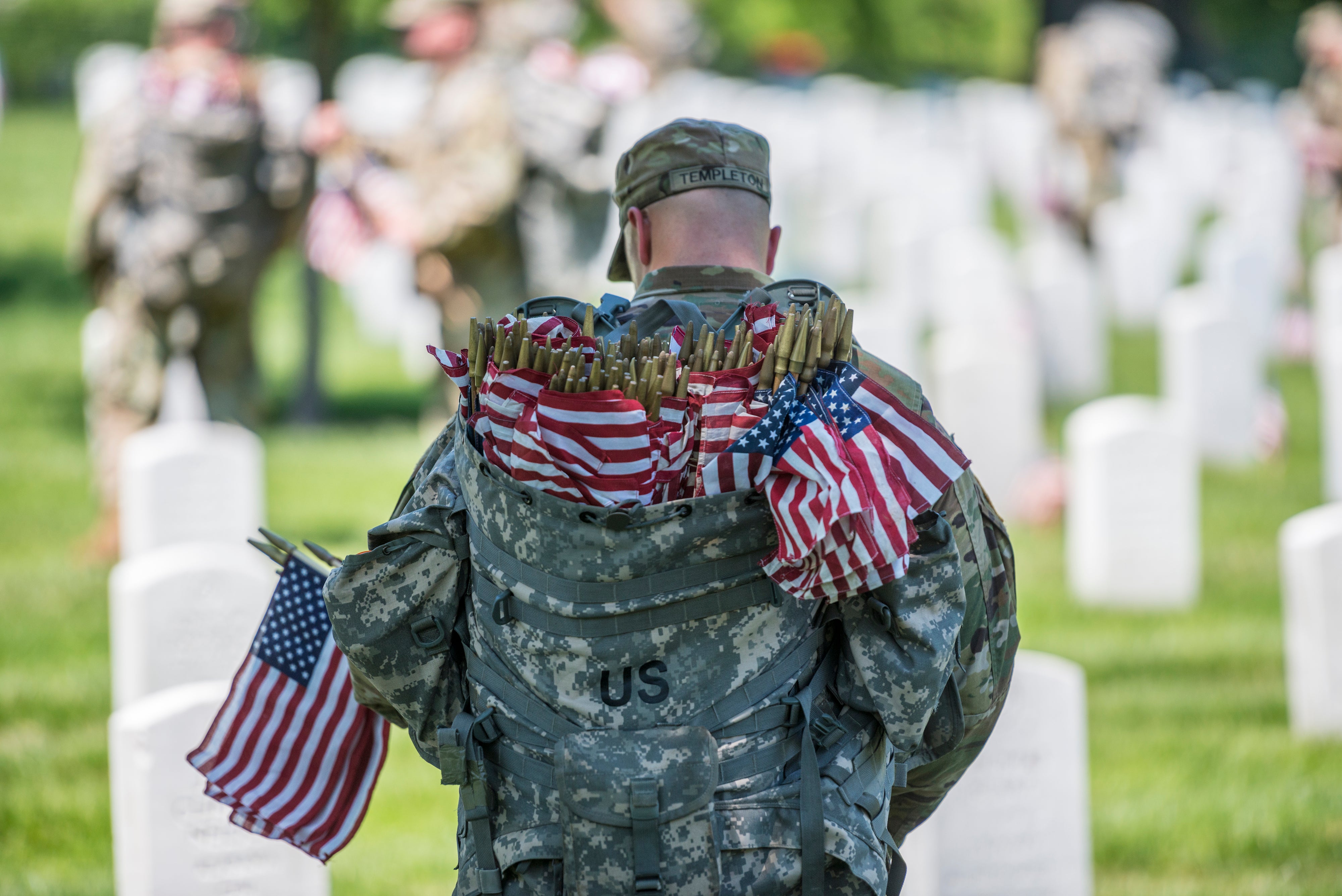 Old Guard Infantry places American flags during the annual Flags In event.