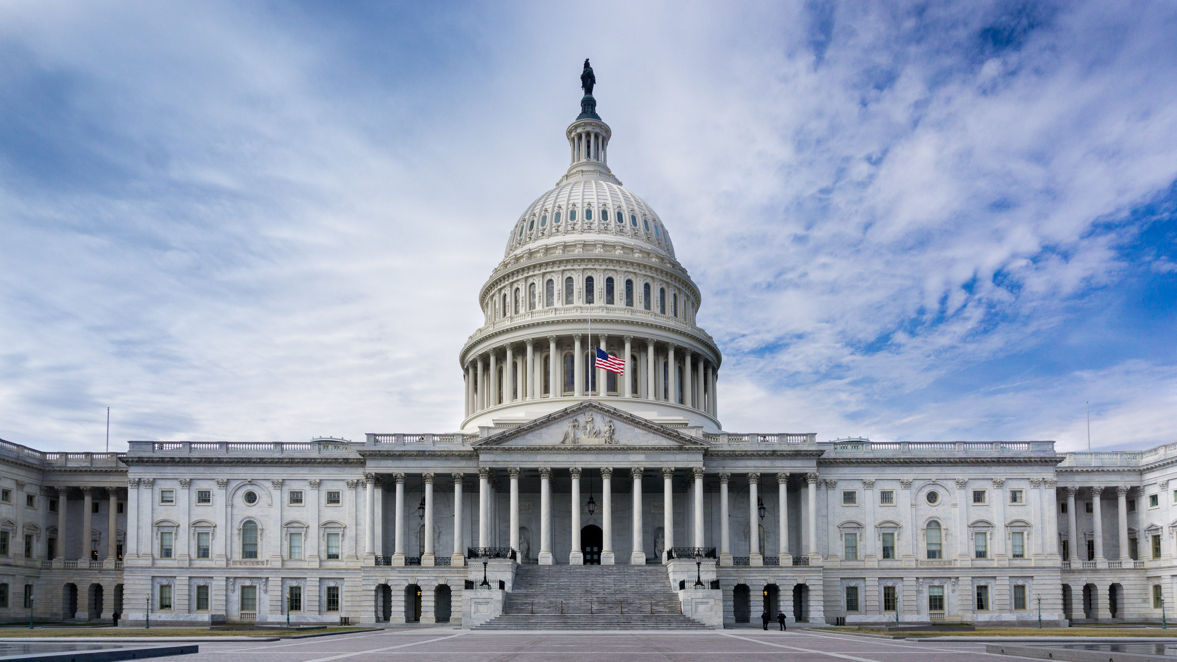 Capital Building With American Flag at Half-staff