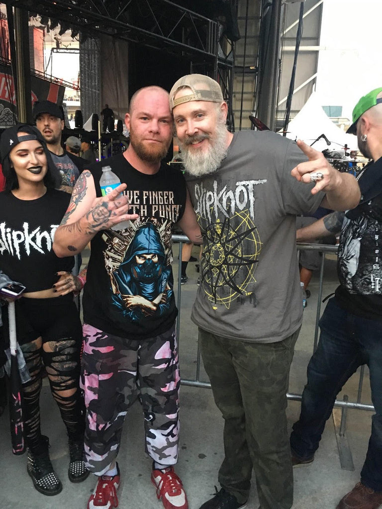 Heavy metal fans on stage at concert