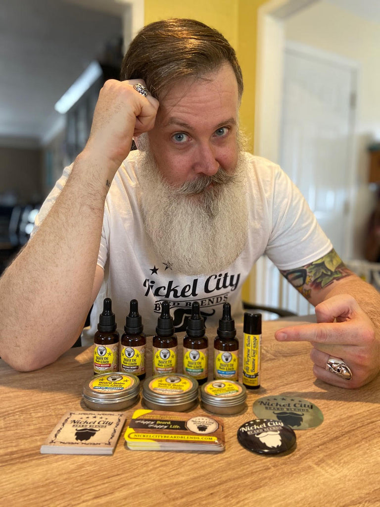 Chris Schneider with products from Nickel City Beard Blends