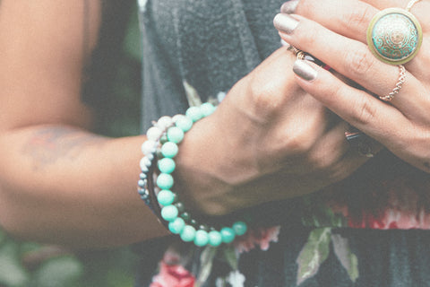 Woman wearing healing bracelets