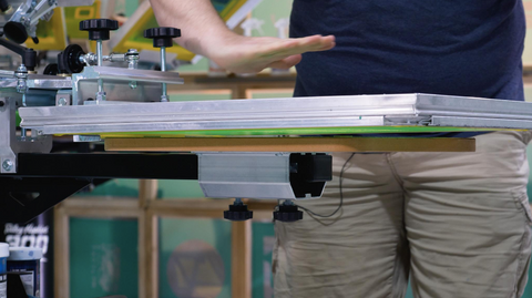 screen tilted on press with person demonstrating the tilt with their hand