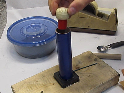 Loading Fireworks Shell into Mortar Tube