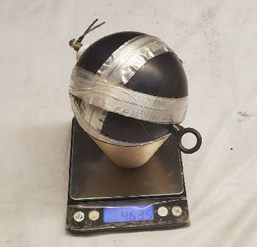 Weighing the fireworks shell on a digital scale