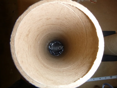 Mortar tube bottom filled with hot glue