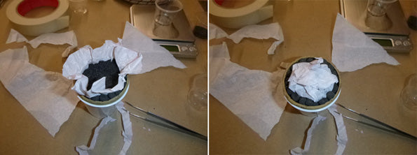 Tissue paper folded over burst charge