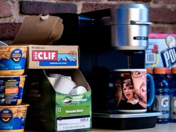 Coffee pods surrounded by other groceries. Photo: Jackson Ruckar