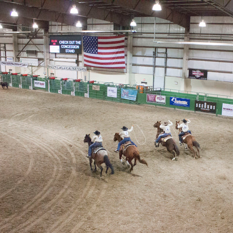 A team of female ropers at the Winnemucca Ranch Rodeo Finals  