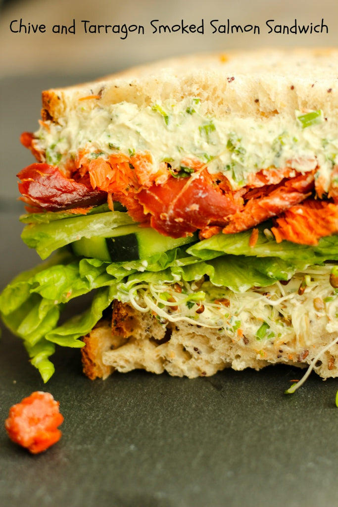 No more boring lunches with this creamy Chive and Tarragon Smoked Salmon Sandwich on a multigrain and seeded bread with fresh veggies.