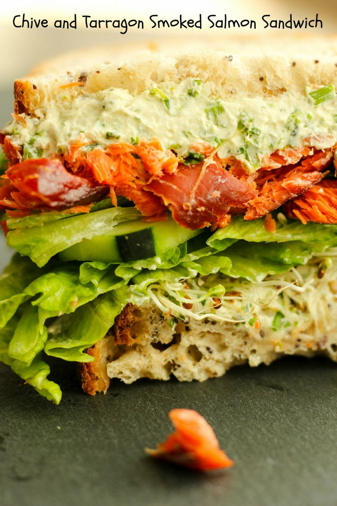 No more boring lunches with this creamy Chive and Tarragon Smoked Salmon Sandwich on a multigrain and seeded bread with fresh veggies.