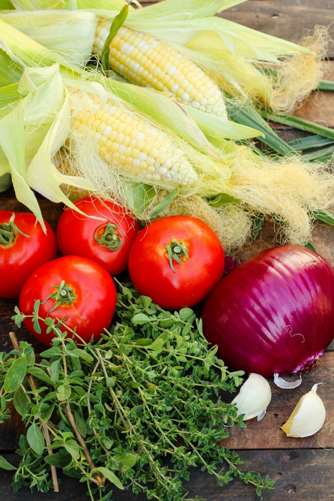 Herbed Pacific Cod, Corn, and Tomatoes is a delicious, seasonally fresh meal poaching pacific cod in herbed water and tossing it with a light dressing.