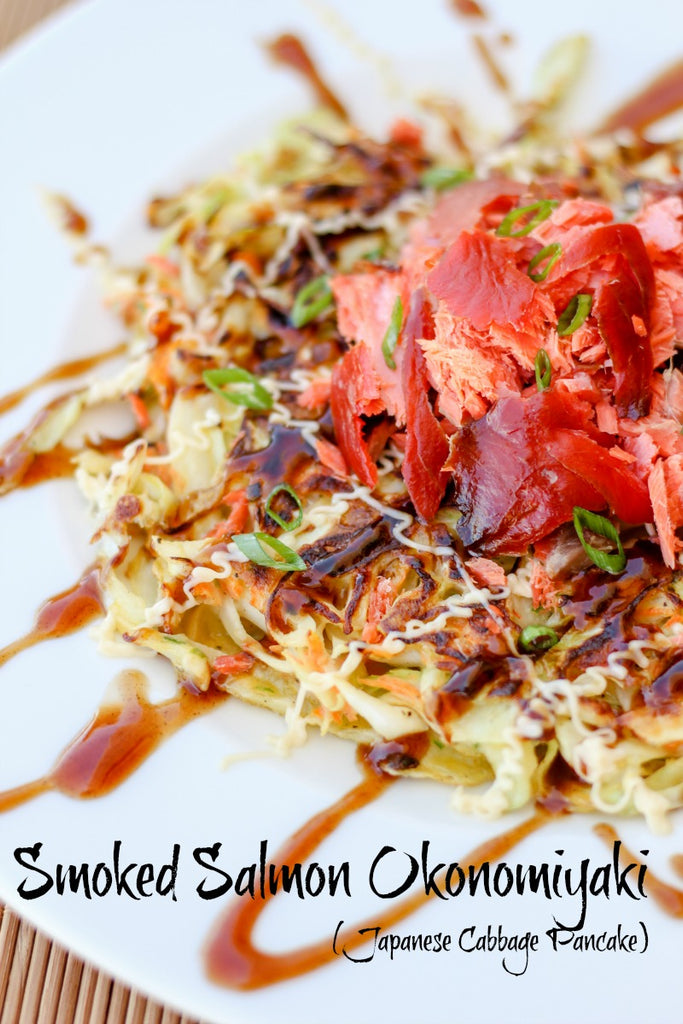 Smoked Salmon Okonomiyaki is a Japanese cabbage pancake with smoked salmon, drizzled with Japanese mayonnaise and okonomi or 'brown' sauce.