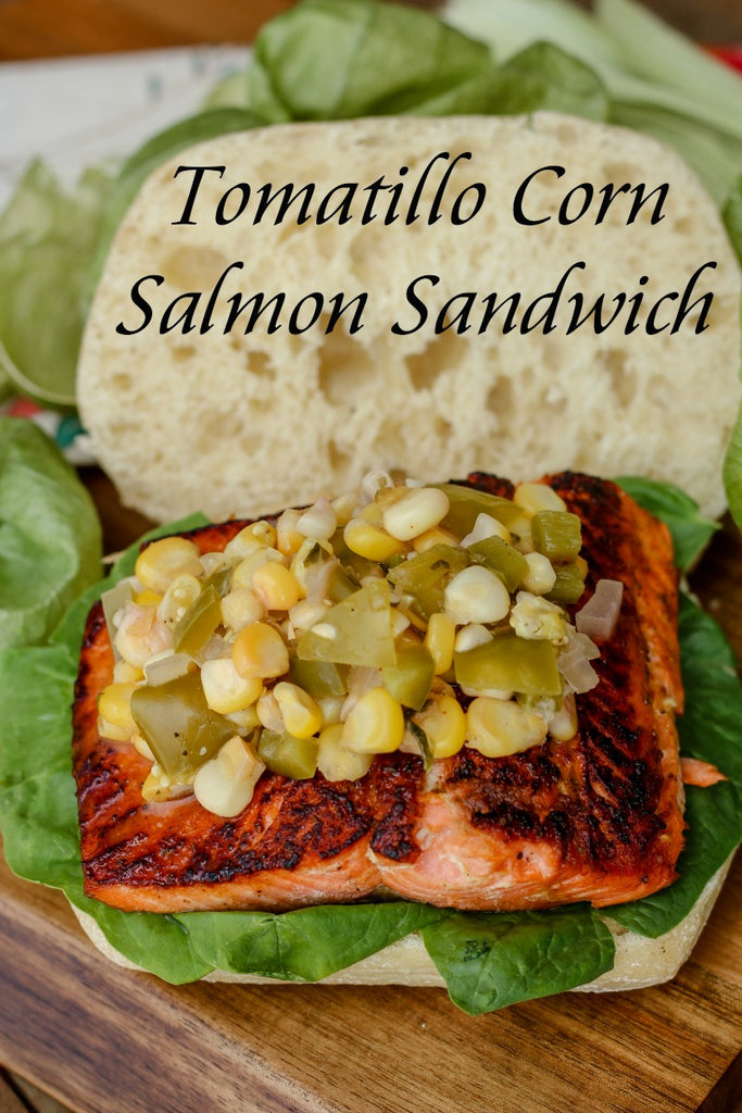 Tomatillo Corn Salmon Sandwich combines unique ingredients like a tomatillo corn relish, sustainable sockeye salmon, and Old Bay seasoning for one tasty nosh. 