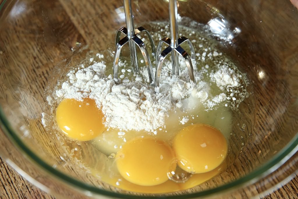 Flour and eggs for corn pudding casserole to be baked in the Fontana wood-fired oven