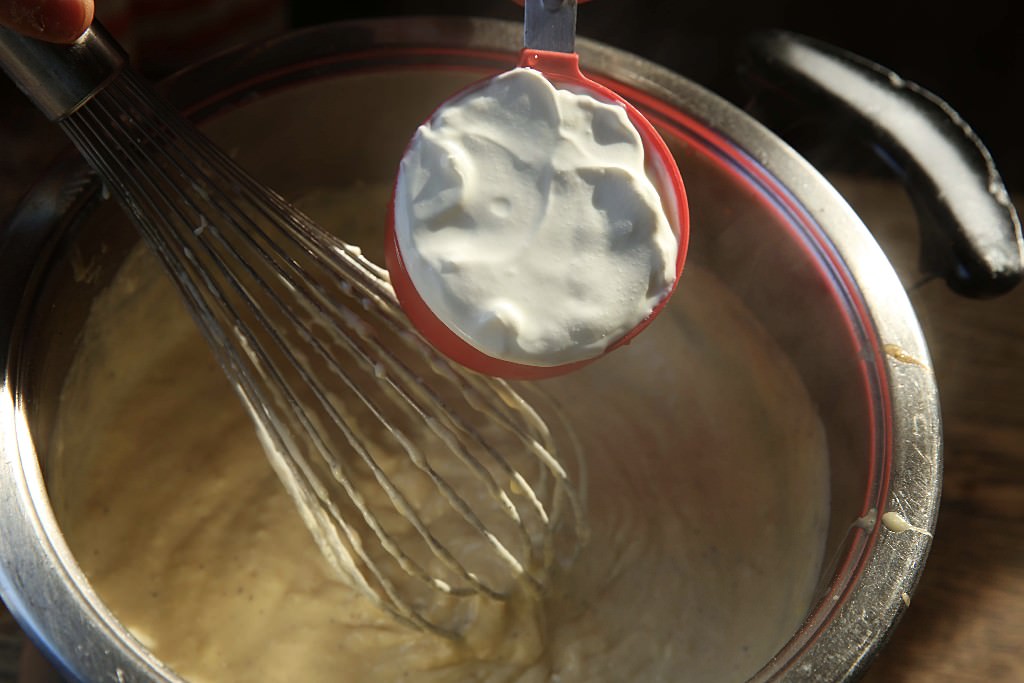 Sour cream for mac and cheese baked in the Fontana wood-burning oven 