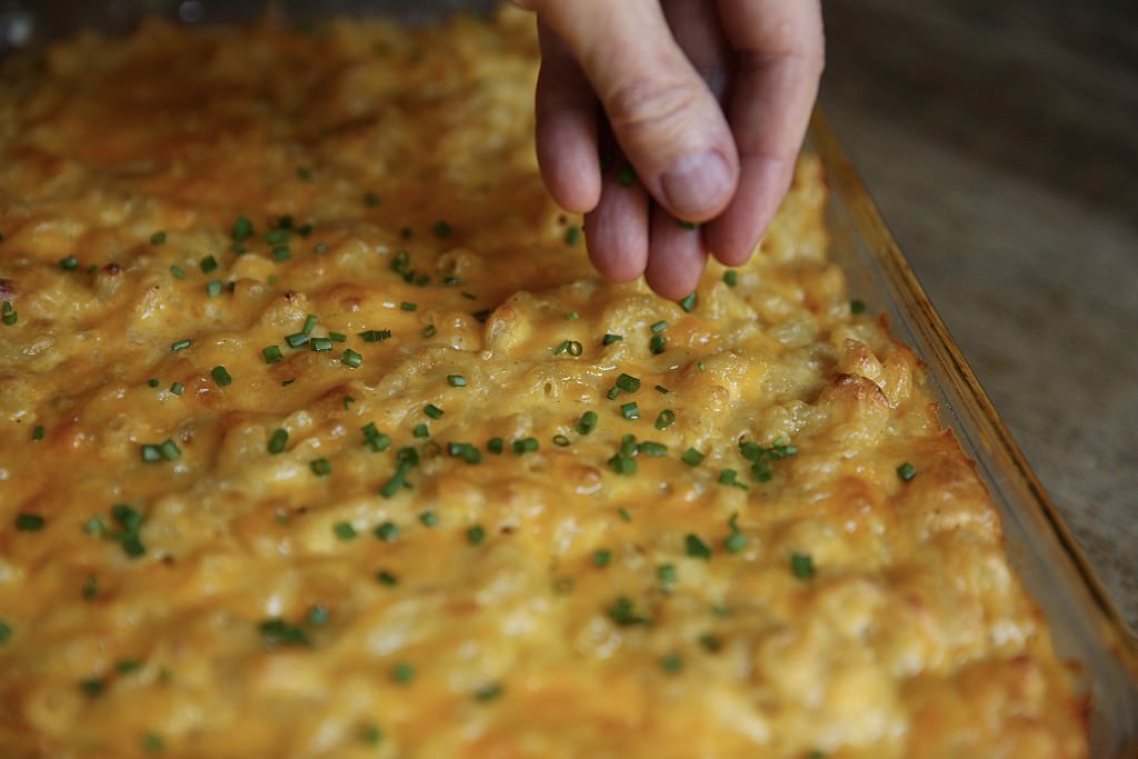 Chives put on finished mac and cheese baked in the Fontana pizza oven