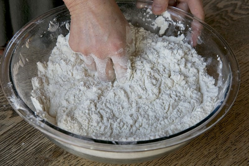 Begin mixing all ingredients together for bread baked in the Fontana wood-fired oven