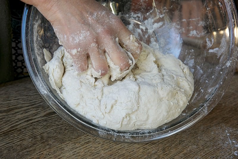 Place dough on the table for bread baked in the Fontana wood-burning oven