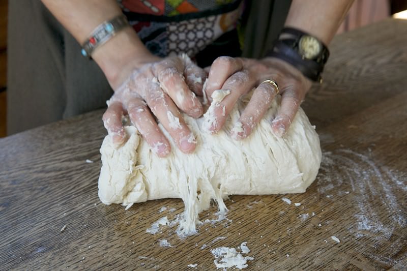 Knead dough for bread baked in the Fontana wood-burning oven