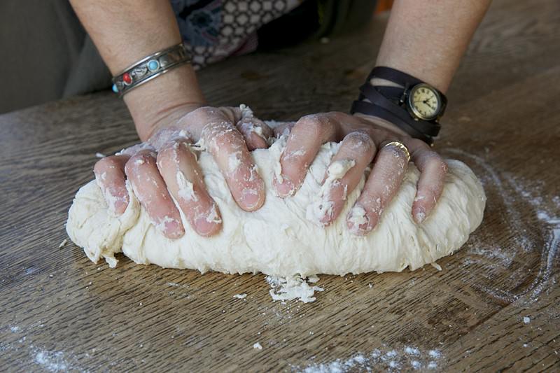 Knead dough for bread baked in the Fontana wood-burning oven