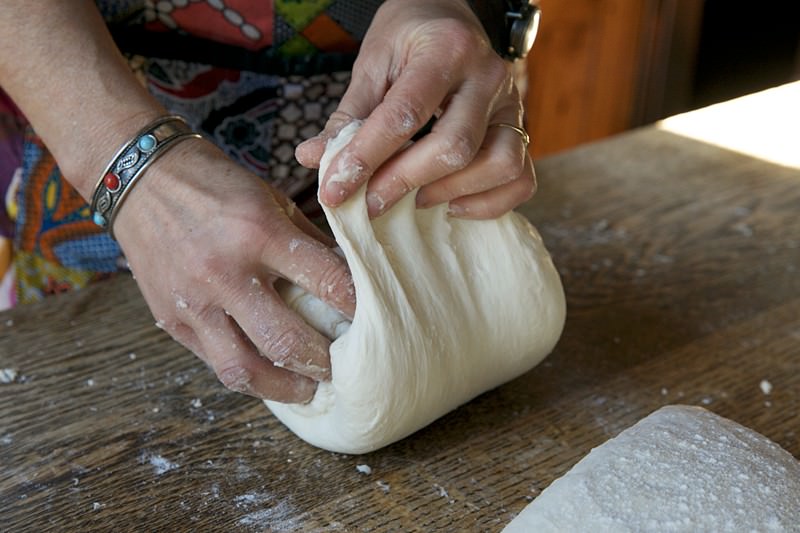 Shape dough for bread baked in the Fontana wood-fired oven