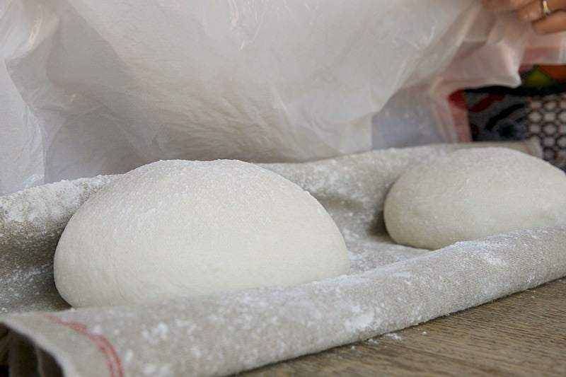 Shape dough for bread baked in the Fontana wood-fired oven