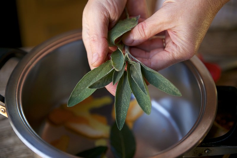 Sage to beplaced in brine for turkey to be baked in Fontana wood-burning oven 