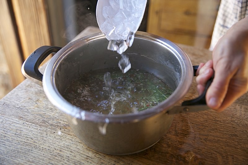 Ice in brine for turkey to be baked in Fontana wood-burning oven 