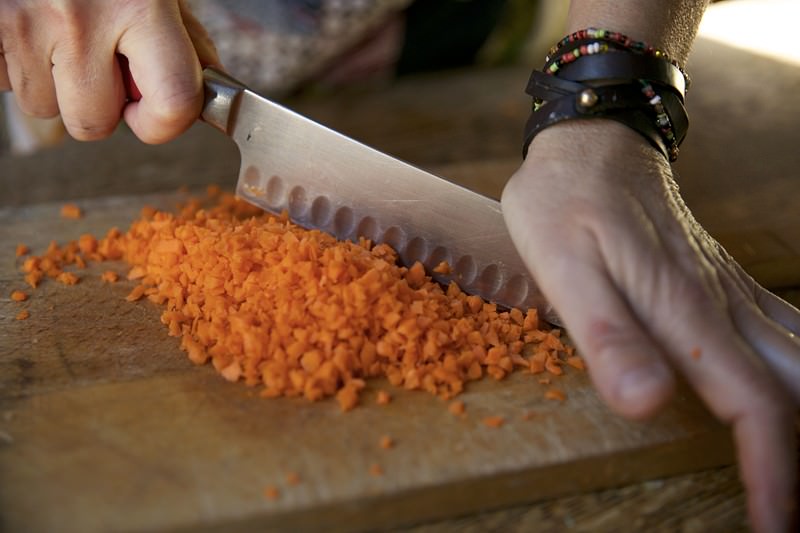 Chopped carrots for turkey to be baked in Fontana wood-burning oven 