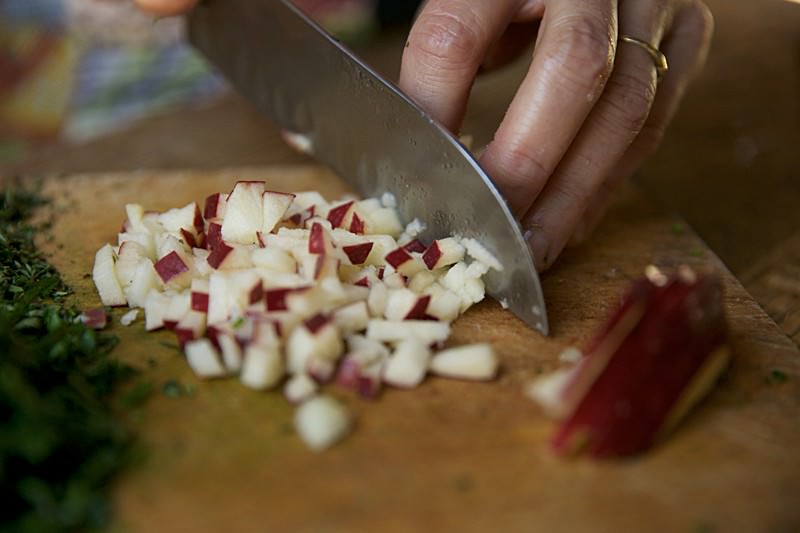 Chopped apple for turkey to be baked in Fontana wood-burning oven 