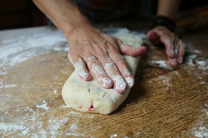 Gently press down the rolled dough with your hands or with the dough cutter making it flat.