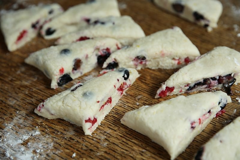 Cut the dough into even triangles with the dough cutter.