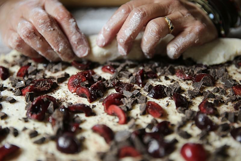 Begin to fold the dough on itself as if you were making cinnamon rolls.