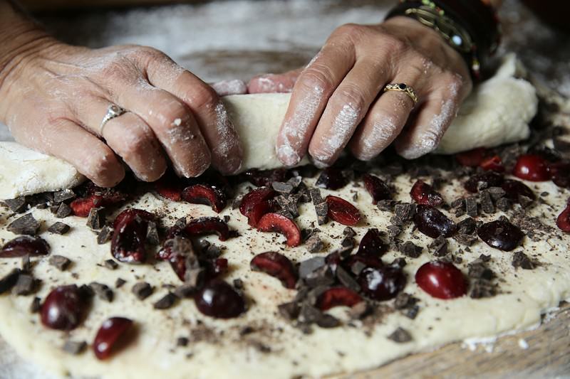 Continue rolling the dough making sure all ingredients stay inside.