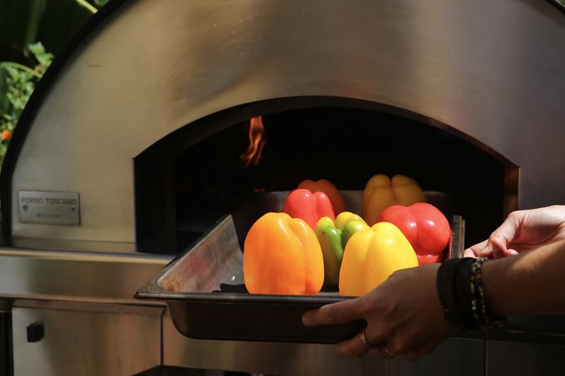 Prepare the wood-fired oven and heat it to about 450° to 500°F.