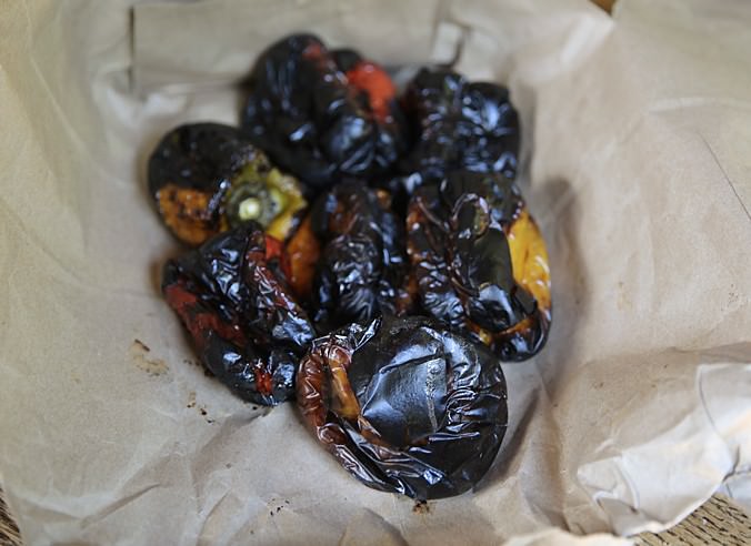 This is how the peppers will look after being steamed in the paper bag. They are now ready to be peeled.