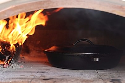 Preheat the cast-iron skillet in the hot oven