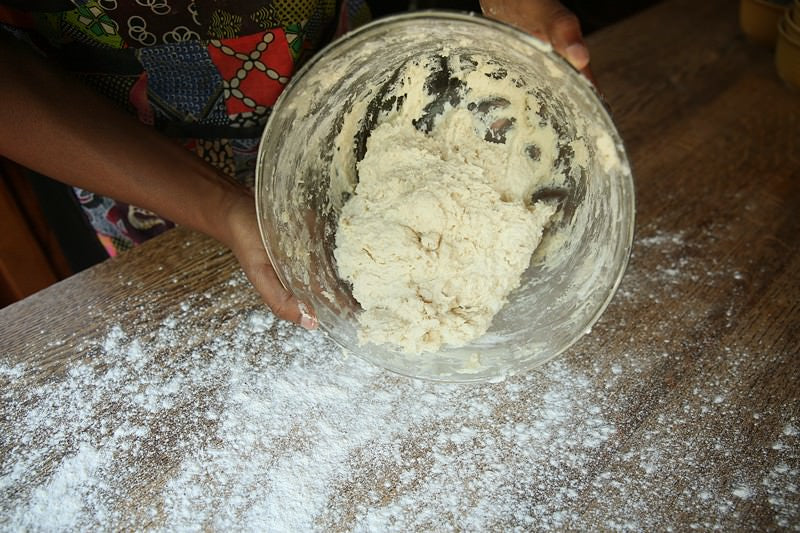 Place the wet dough on a well-floured surface