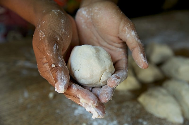 Gently roll the dough into a ball with your hands
