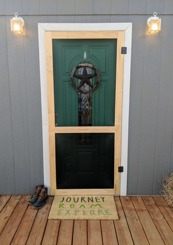 decorated front door and porch